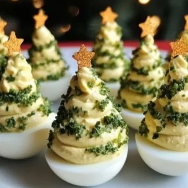 Deviled Egg Christmas Trees 4 Festive deviled egg Christmas trees arranged on a platter