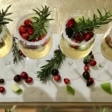 Christmas Sangria 1 Festive Christmas Sangria in a glass with fruits and spices for holiday celebrations