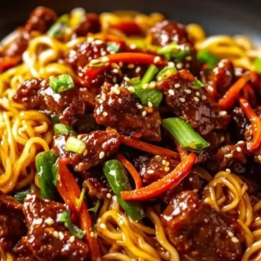Delicious sticky beef noodles served in a bowl