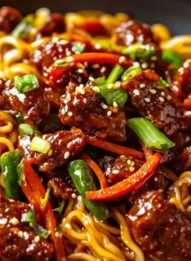 Delicious sticky beef noodles served in a bowl