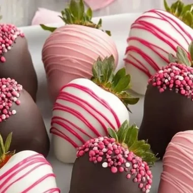 Delicious chocolate covered strawberries on a plate, ideal for desserts and gifts