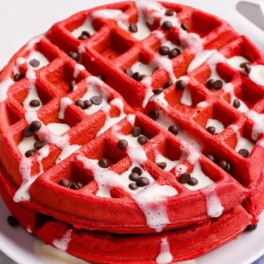Red Velvet Waffles 2 Delicious Red Velvet Waffles topped with cream cheese frosting and berries.