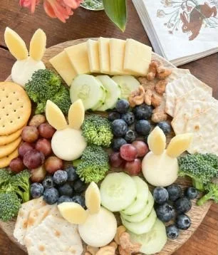 Easter Charcuterie with Babybel Bunnies and festive decorations