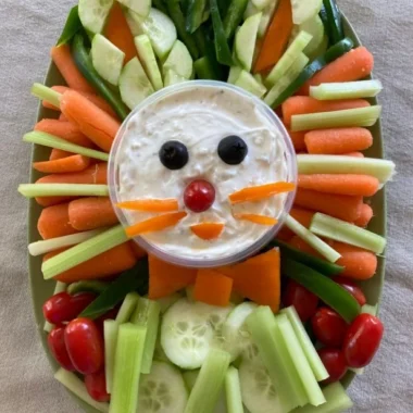 Easter Bunny Veggie Tray 1 Colorful Easter Bunny veggie tray with assorted vegetables arranged creatively.