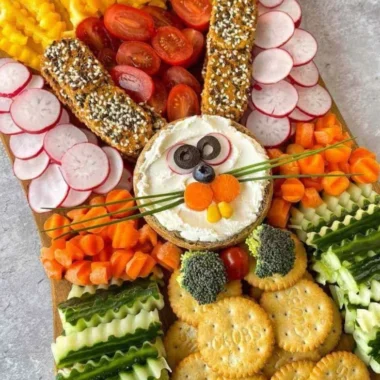 Easter Veggie Charcuterie Board 2 Easter veggie charcuterie board with vibrant vegetables and colorful dips